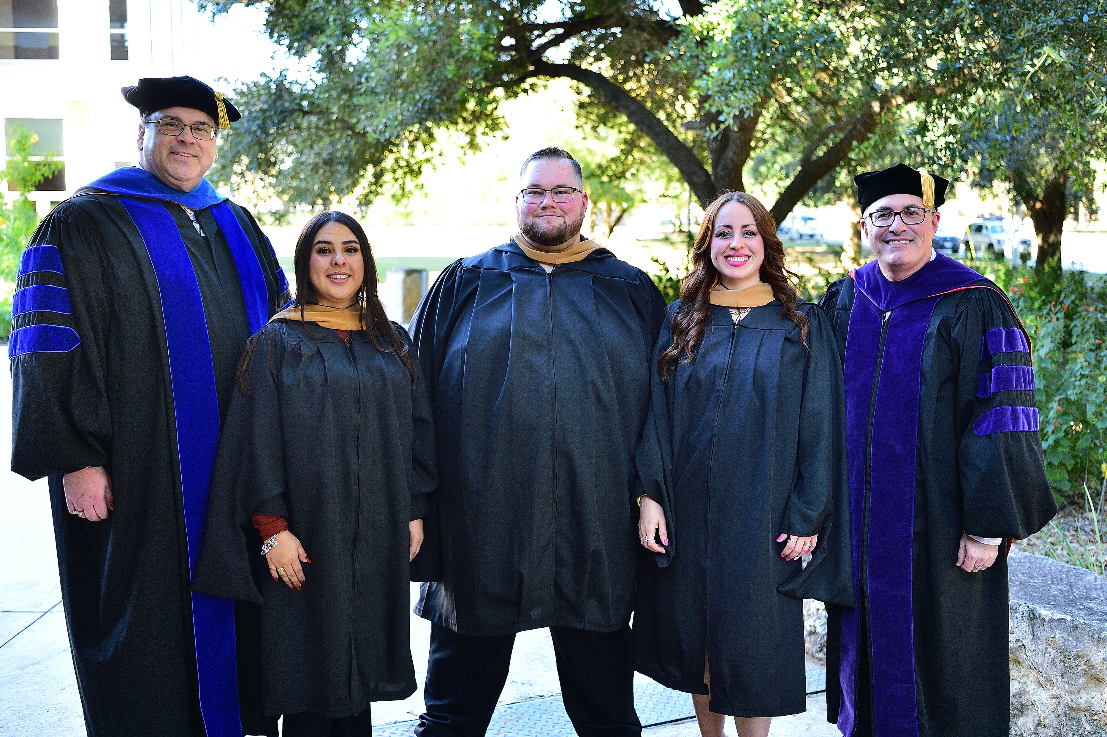TLU’s MBA Class of 2023 graduates pictured with their professors
