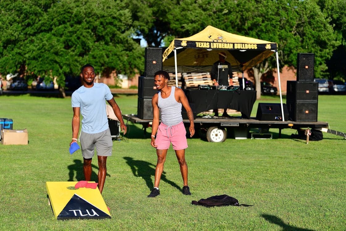 students playing games on lawn