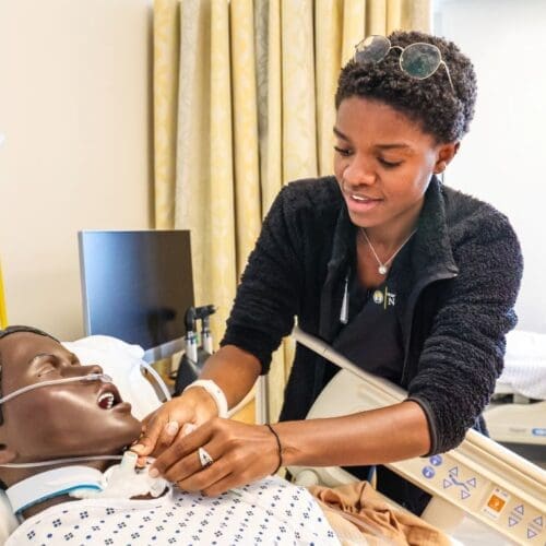 nursing student in lab