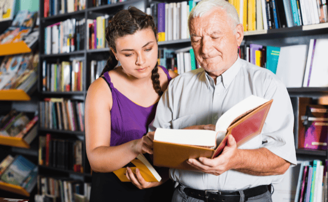 stock photo - people reading a book