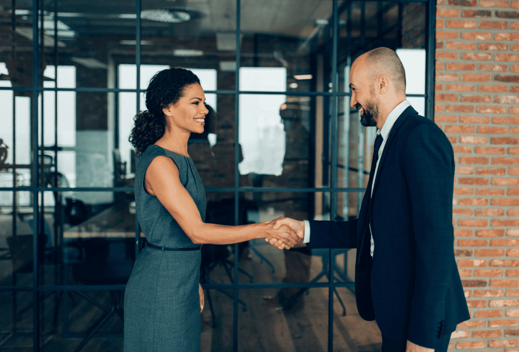 stock photo - business partners shaking hands