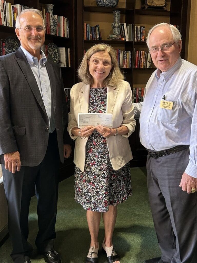 Mr. J. Steven Awalt, President of the Crawford & Hattie Jackson Foundation; TLU President Dr. Debbie Cottrell, and Mr. Rodney Koenig, Vice-President of the Crawford & Hattie Jackson Foundation