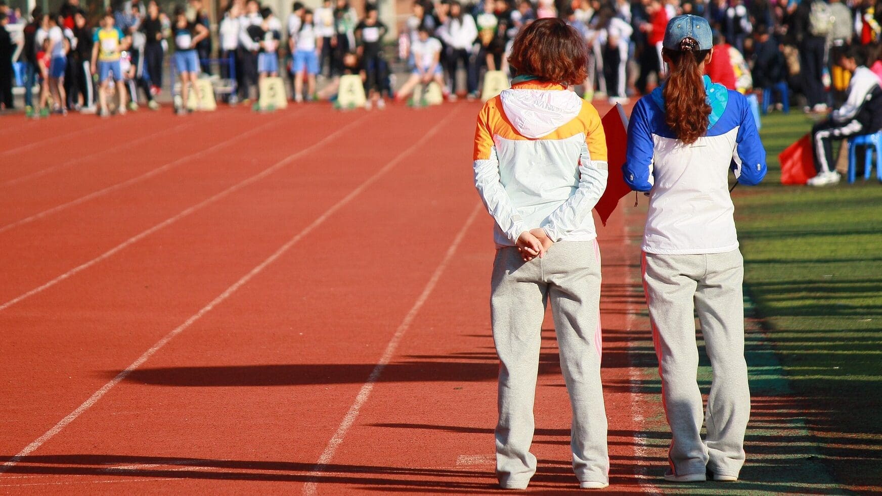 student volunteers at a track event