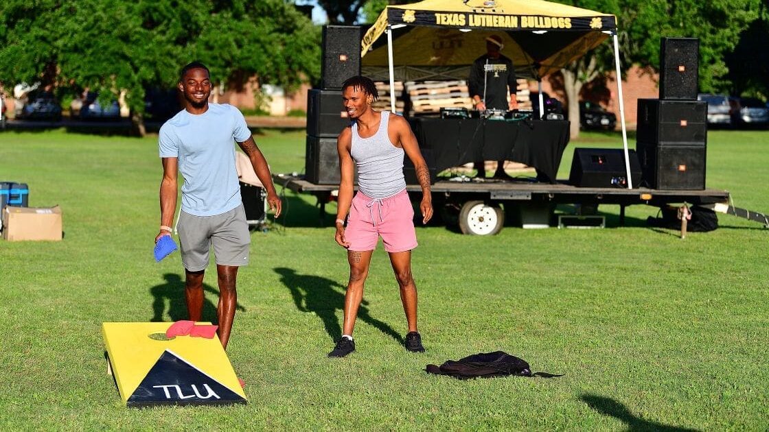 students playing games on lawn