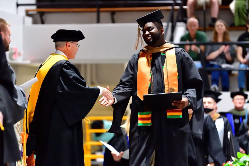 Student receiving diploma